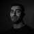 monochrome-portrait-of-a-man-with-dark-hair-2026-01-06-10-00-55-utc_optimized_200